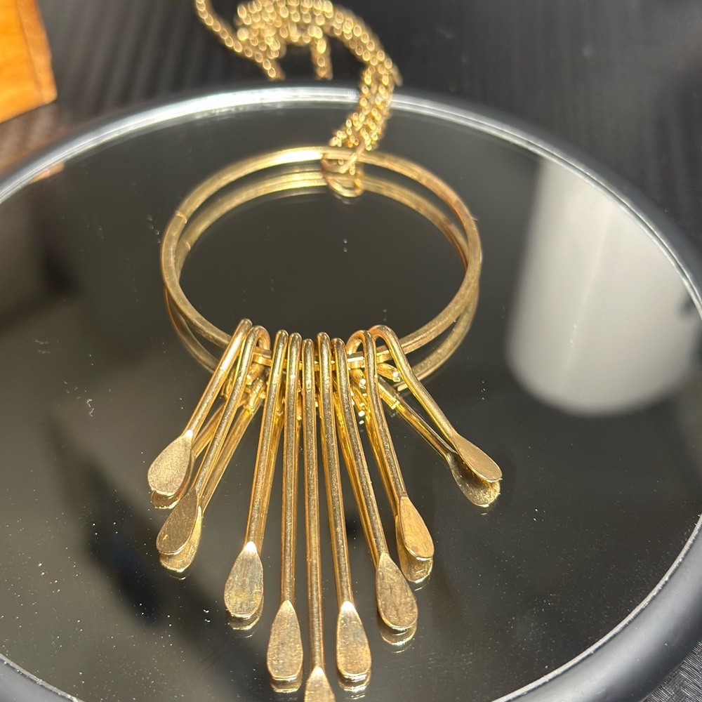 Elegant Gold Necklace with Unique Pendant